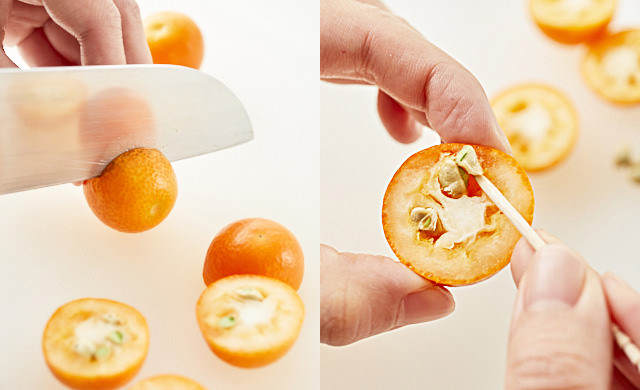 きんかんをカットし、種を取り出している写真