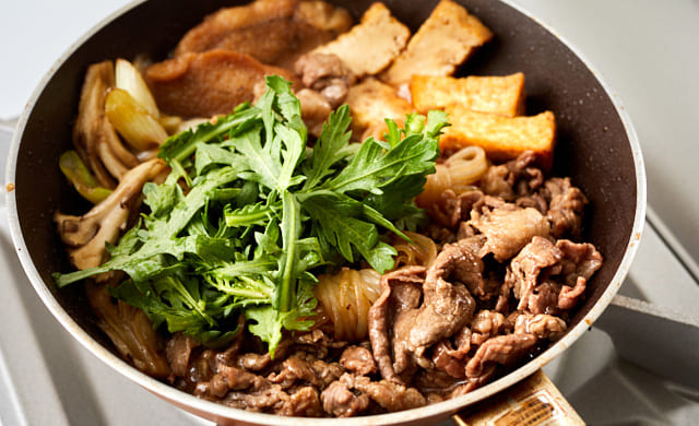 春菊を加えている写真